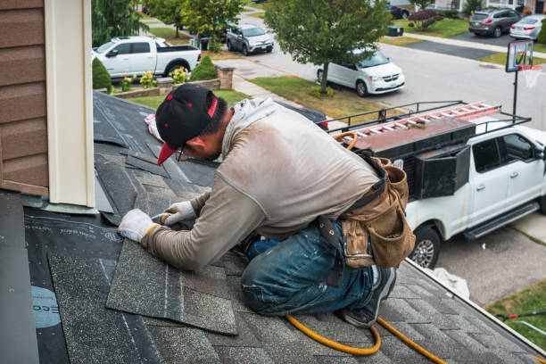 Professional Flat Roof Repair technician working in Saxton, PA